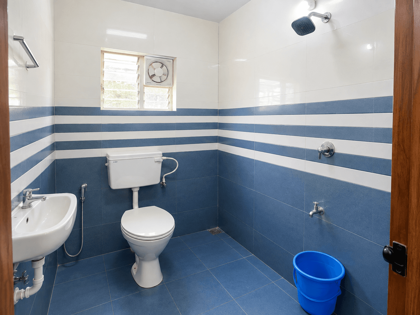Attached bathroom of the four sharing room